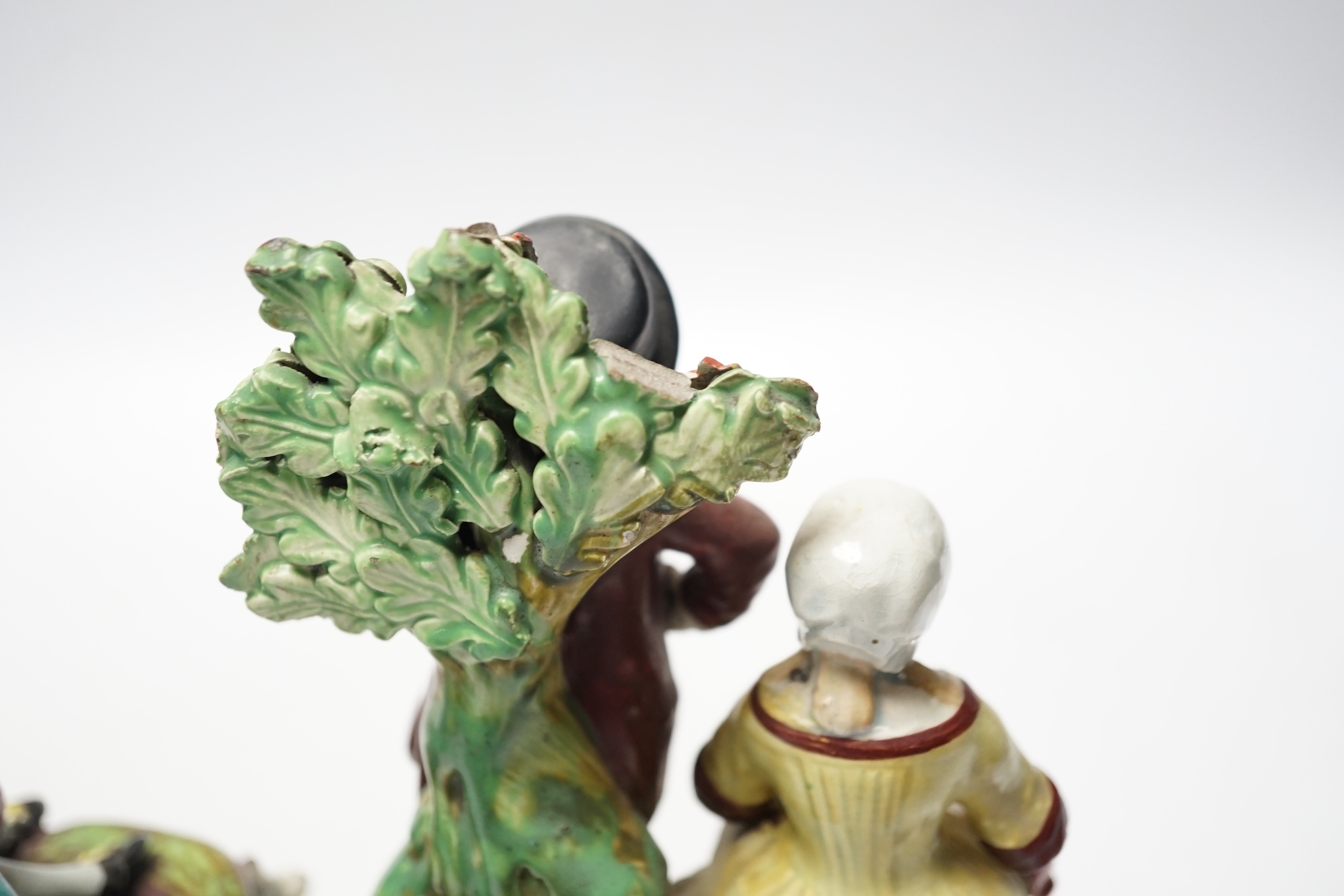 Two Staffordshire pearlware groups of musicians, c.1810-25, largest 20cm high
